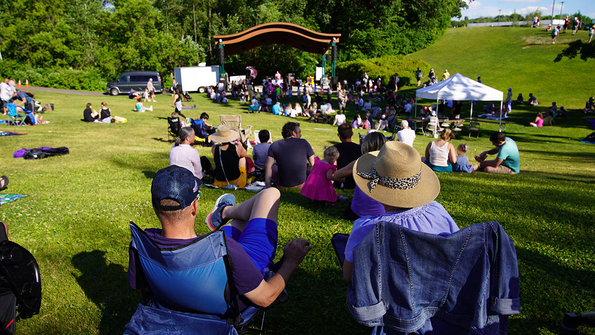 People in chairs around amphitheater