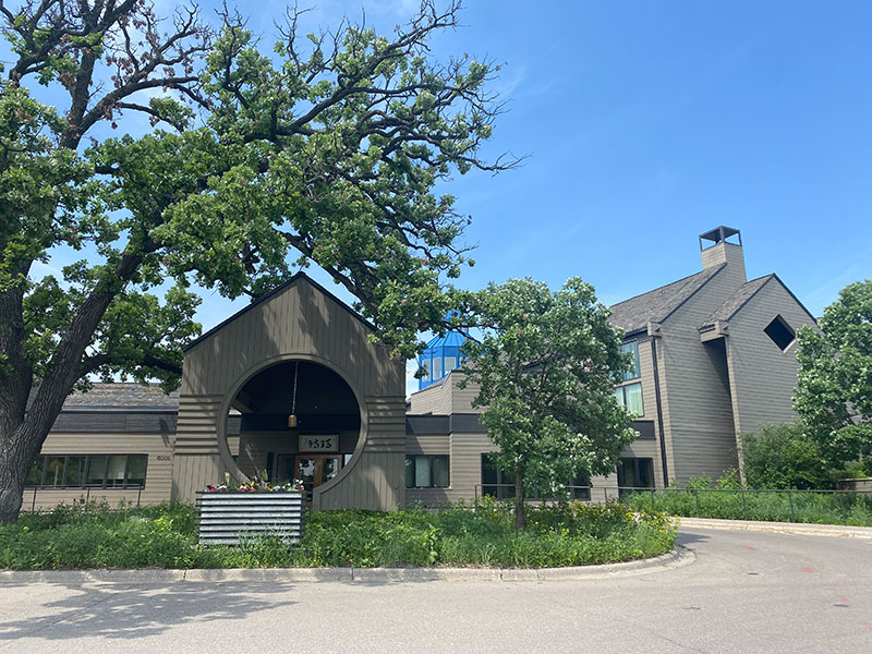 Building with trees and blue tower