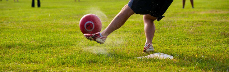 person kicking ball